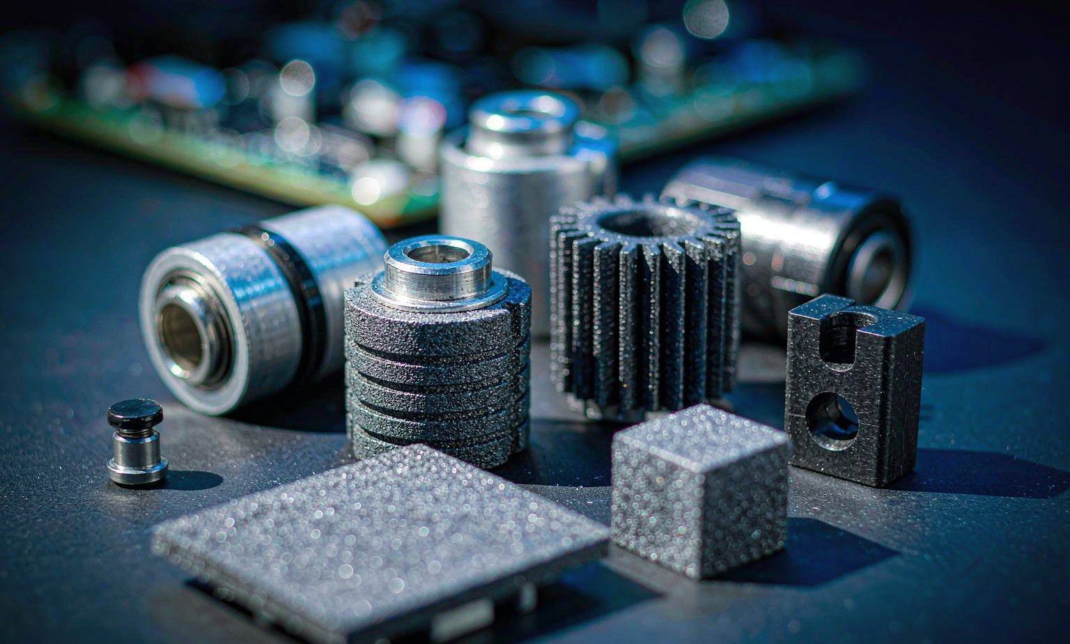 Soft magnetic composite cores and sintered pole pieces