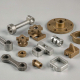 Sintered structural powder metal components including connecting rods, flanges, brackets and cams.